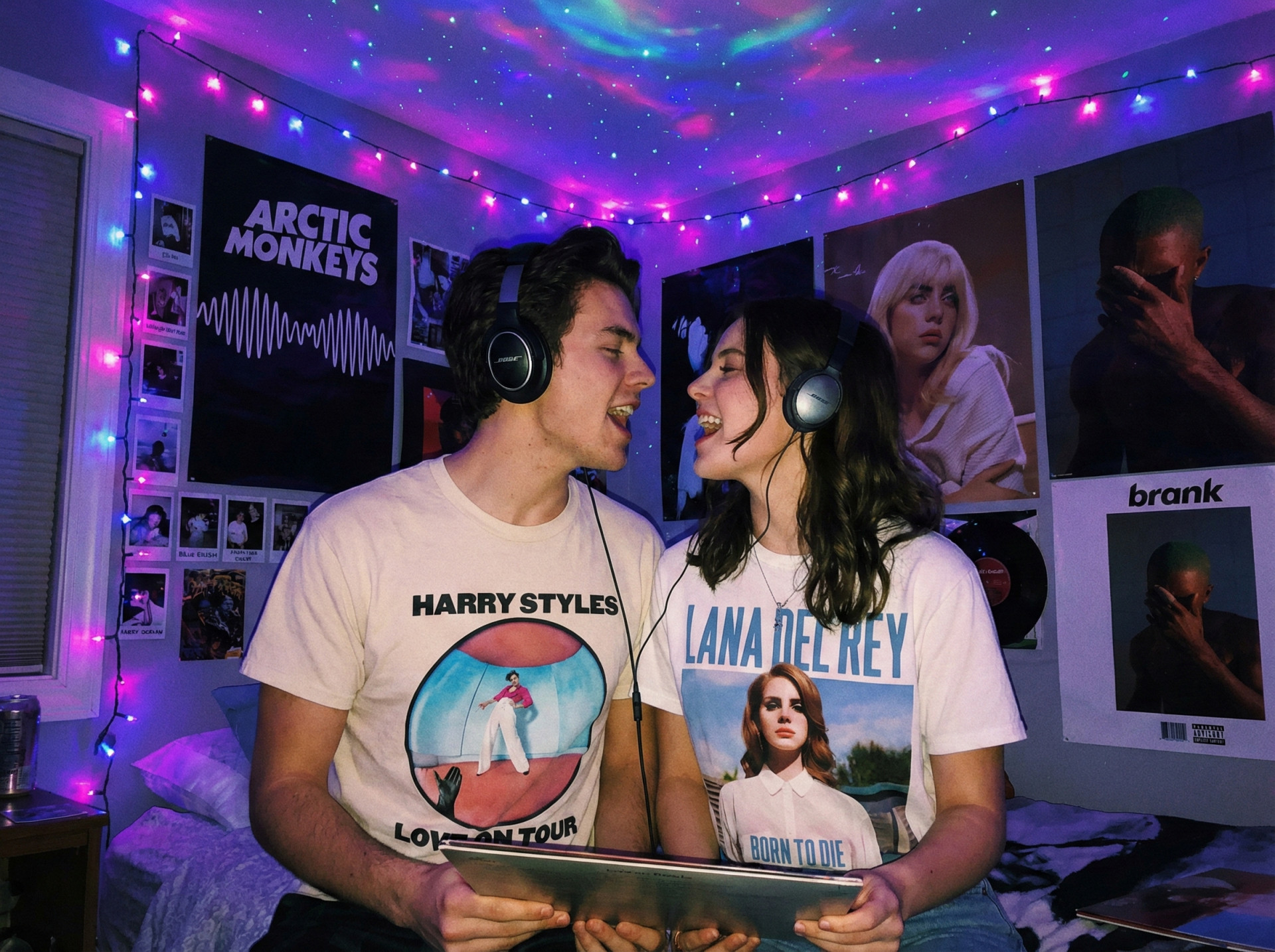 Couple wearing MUSIHA concert tour t-shirts
