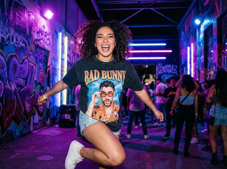 Young woman wearing concert graphic t-shirt at music festival