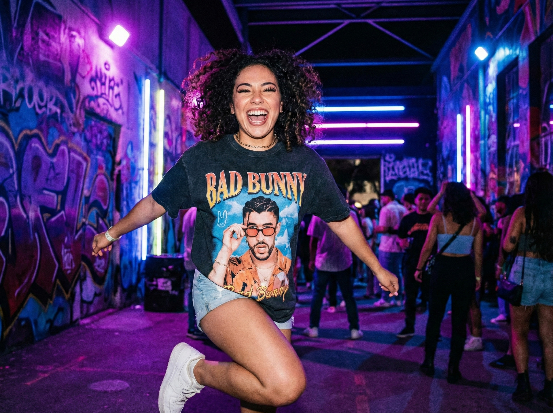 Young woman wearing concert graphic t-shirt at music festival